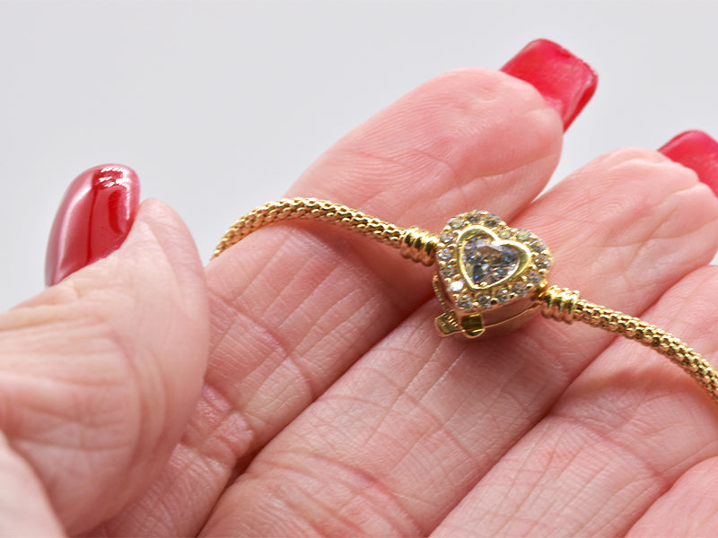 14K Charmed Bracelet 9.86 grams