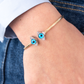 14K Gold Blue Eyes Bracelet with Zirconia 7.69 grams 2.5 inches Width