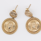 Dangling medusa 14kt gold earrings 8gr